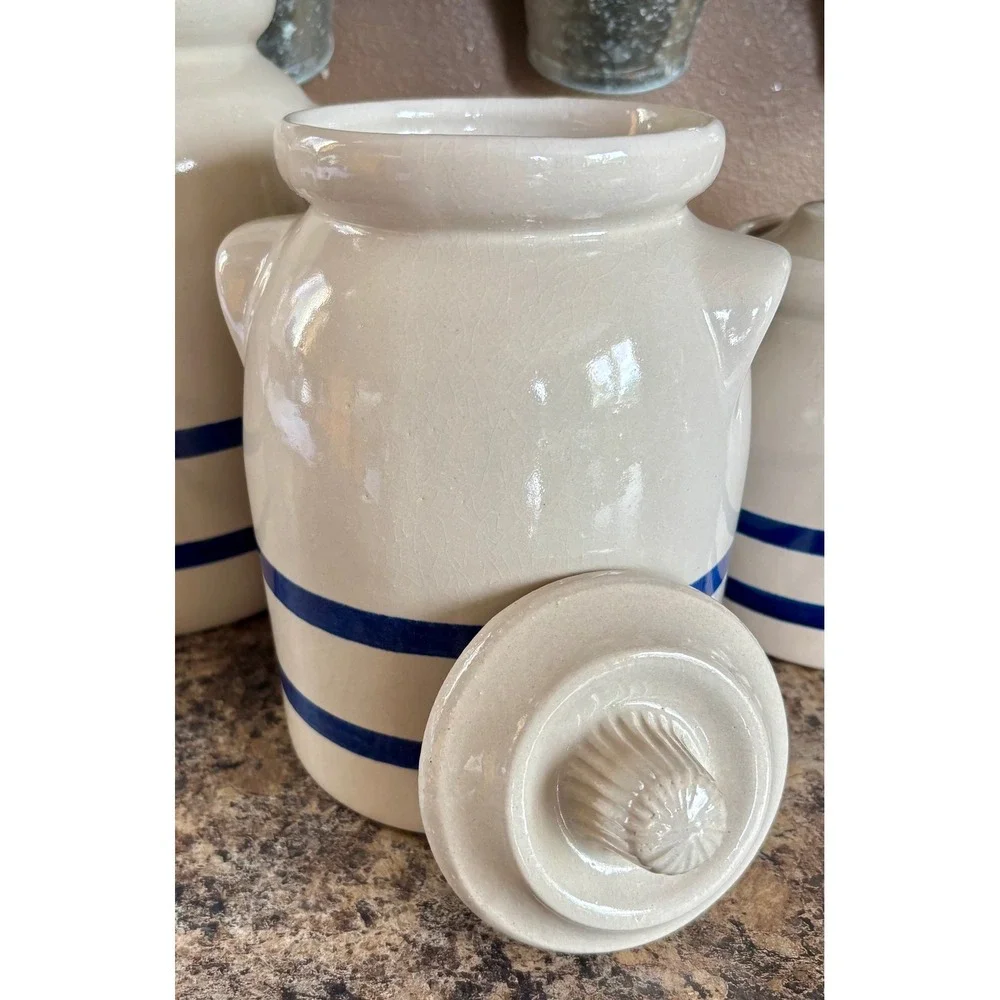 Complete set of Robinson Ransbottom canisters (1 pint, 1 qt, 2 qt).